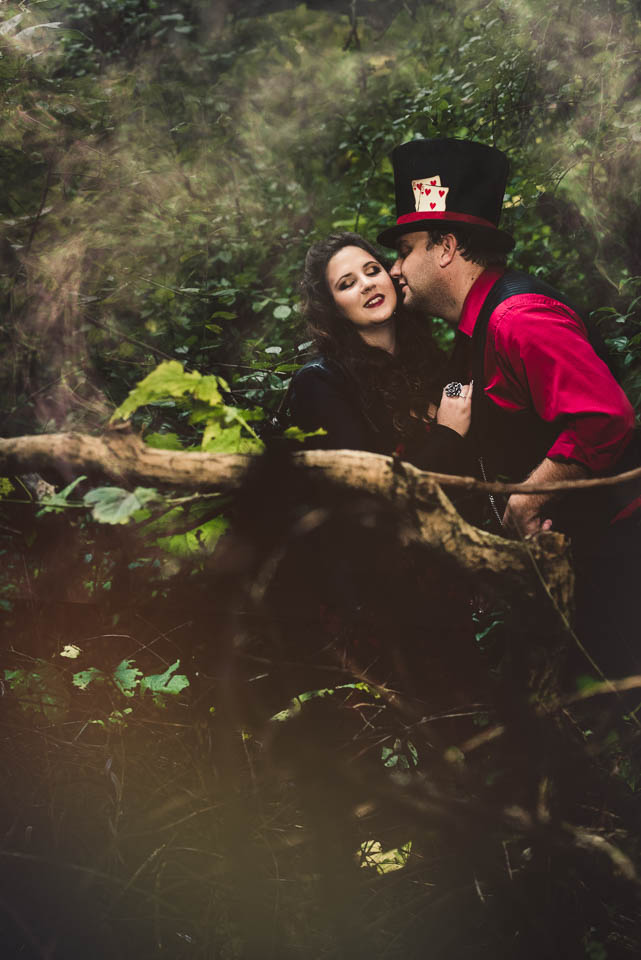 Queen of Hearts and Mad Hatter in the woods