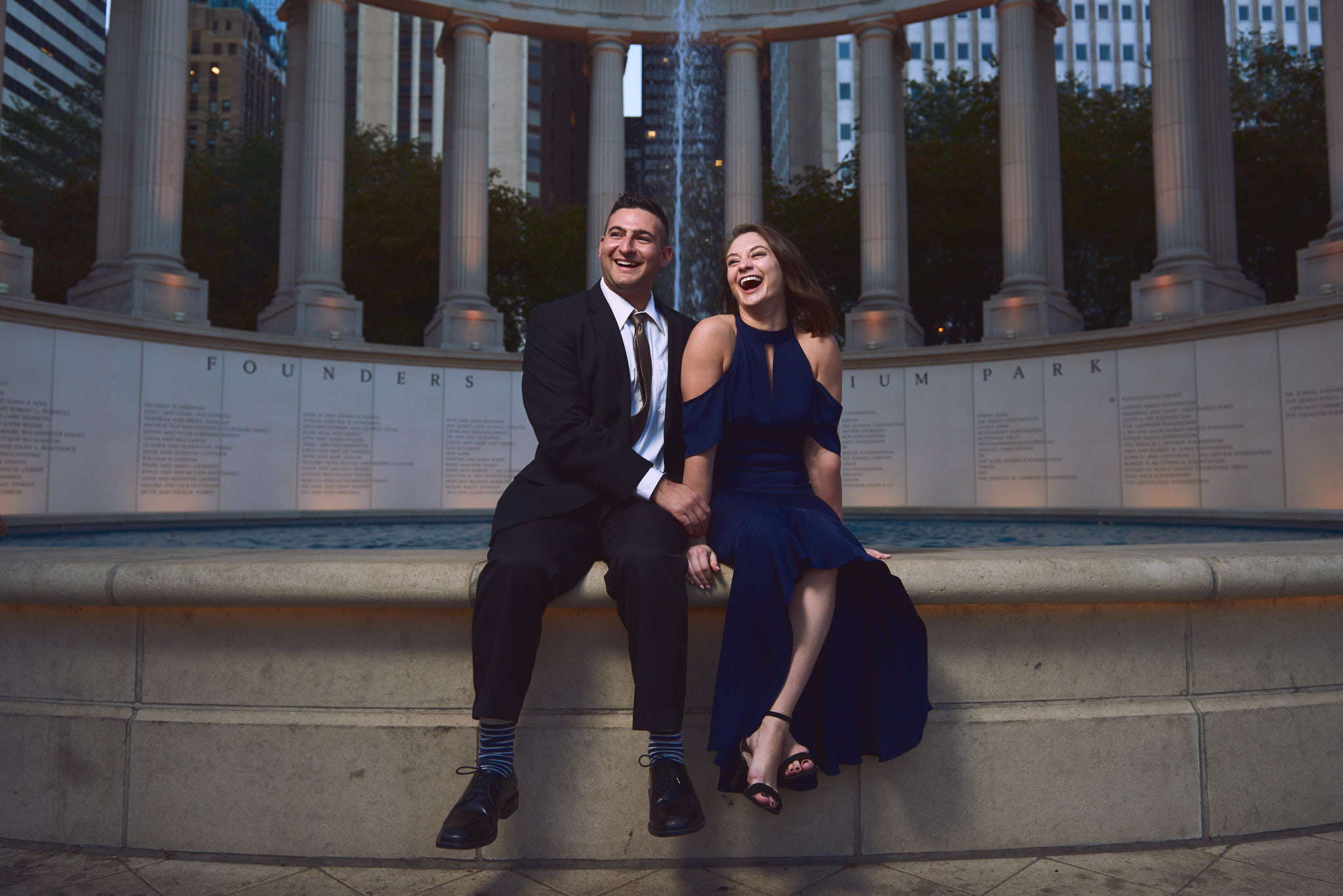 Laughing engagement portrait at Wrigley Square
