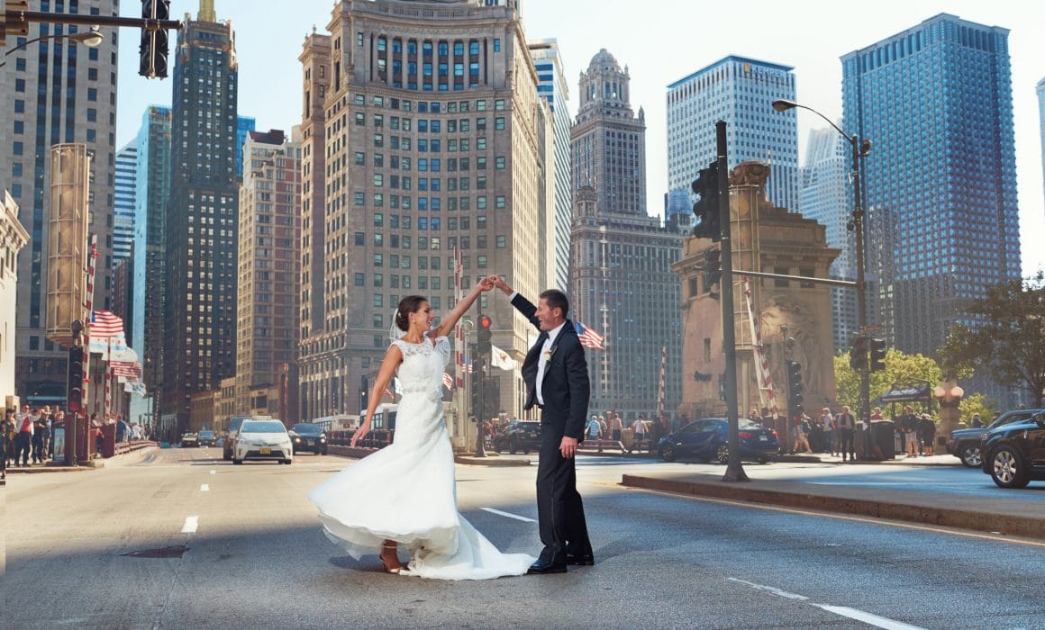 Bride and groom dancing on Michigan Ave