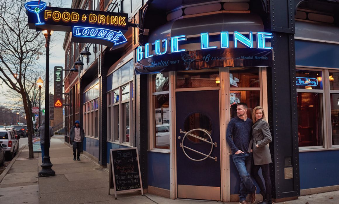 Couple in front of Blue Line restaurant