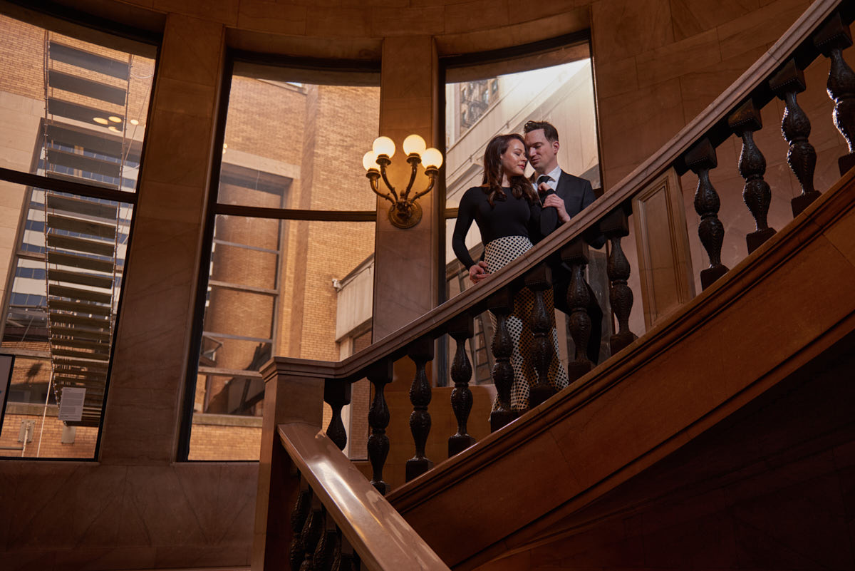 Engagement portrait on stairs at Chicago Cultural Center