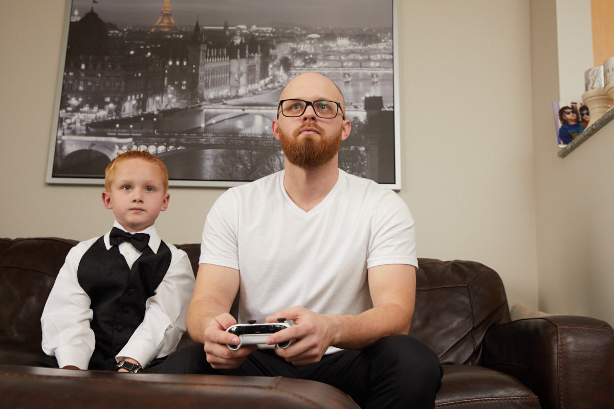 Groom playing video games